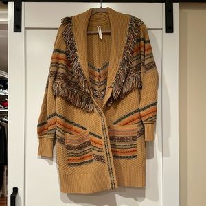 Anthropologie long fringe cardigan.